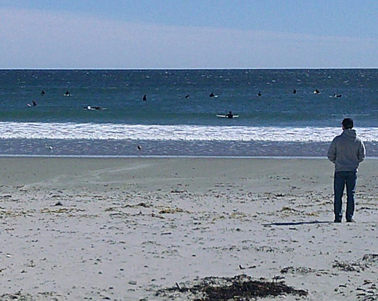 Surfers at Rye Beach, NH, USA