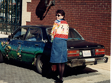 Eileen Morey with the Glittermobile